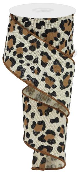 a roll of leopard print ribbon on a white background