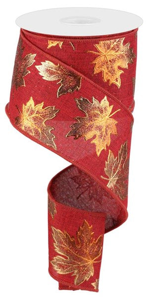 a red ribbon with gold leaves on it