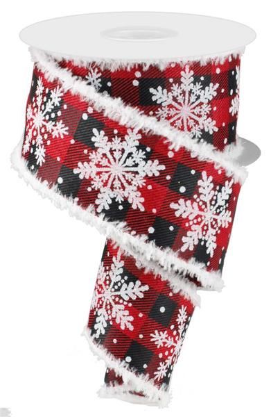 a roll of christmas ribbon with snowflakes on it