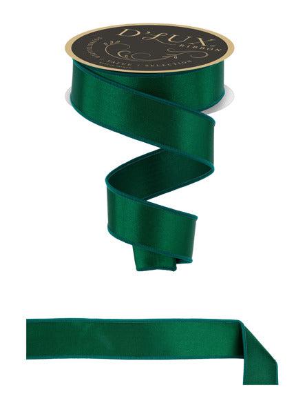 a roll of green satin ribbon next to a roll of green satin ribbon