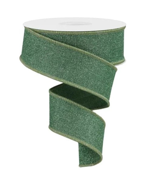 A roll of green glittery ribbon with a spiral pattern.