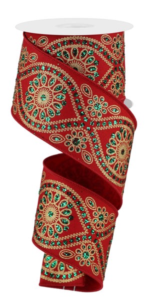 a red ribbon with green and gold designs on it