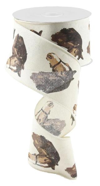 a roll of white ribbon with dogs on it