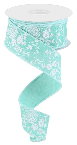 a ribbon with white flowers on a light green background