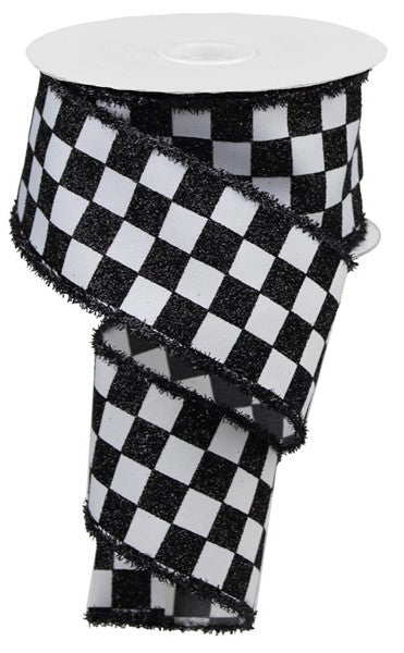 a roll of black and white tape with black and white squares on it