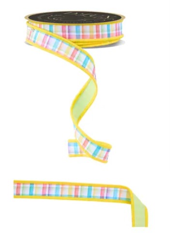 A roll of multicolored ribbon with a yellow border, featuring a plaid pattern.