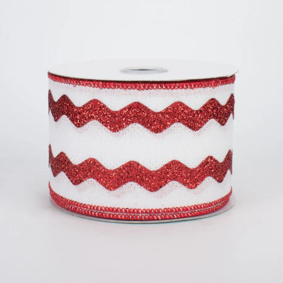 a roll of red and white glitter ribbon