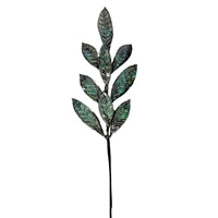 a metal plant with green leaves on a white background