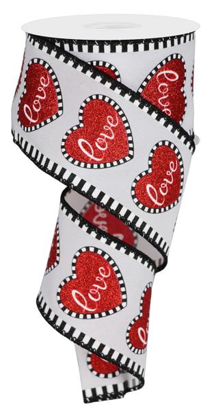 a roll of toilet paper with hearts on it