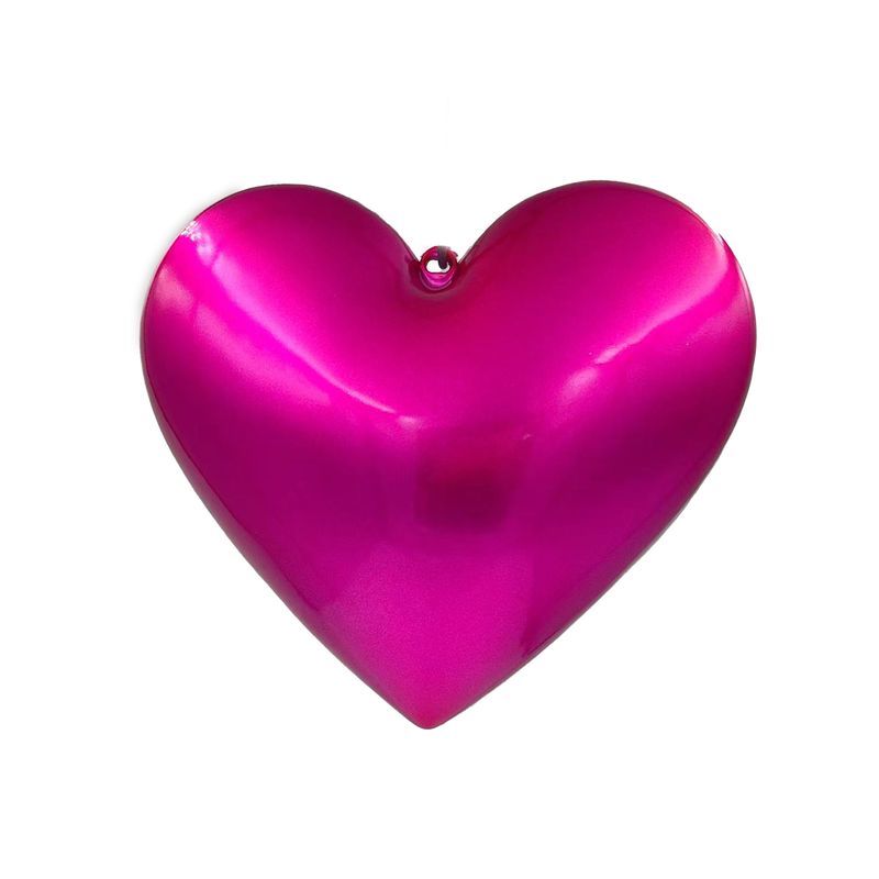 a pink heart shaped object on a white background