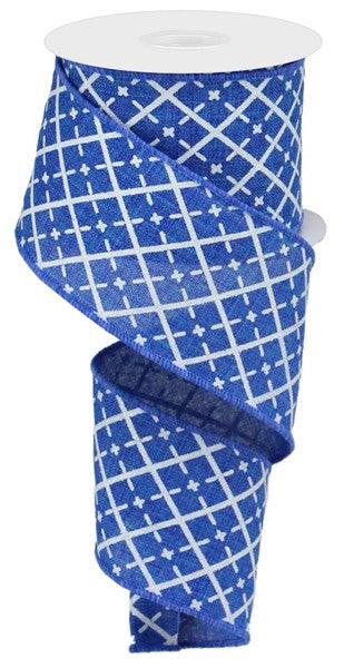a roll of blue and white patterned ribbon