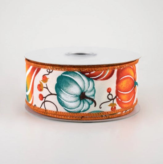 A roll of ribbon with a pumpkin and leaf pattern printed on it.
