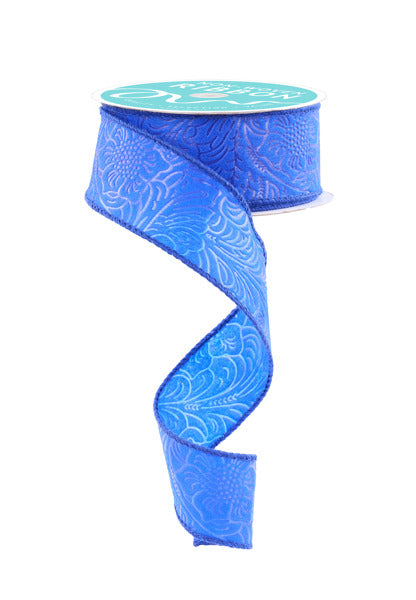 a roll of blue ribbon on a white background