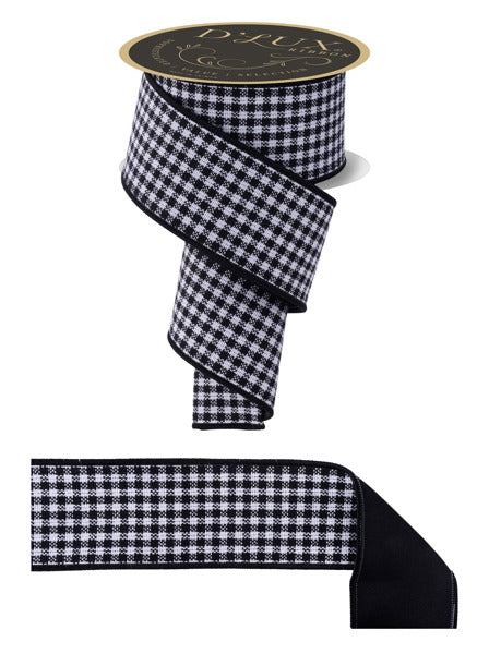 a black and white checkered ribbon with a gold label.