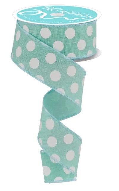 A turquoise and white polka dot ribbon is shown, with the ribbon winding around itself in a spiral pattern.