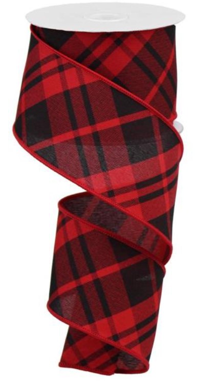 a roll of red and black plaid ribbon