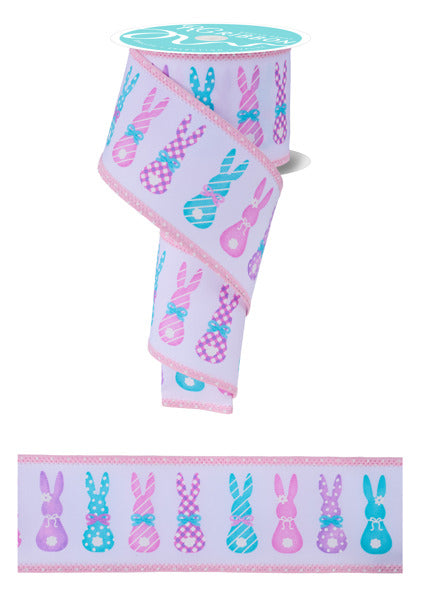a roll of pink and blue tape with bunny ears on it