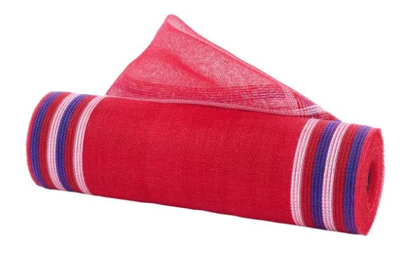 A red and blue striped yoga mat is rolled up and placed on a white background.