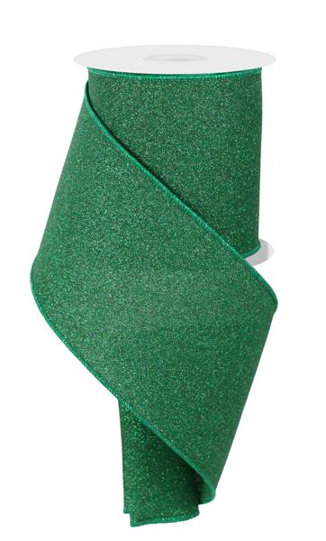 a roll of green glitter ribbon on a white background