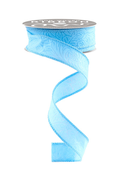 a light blue ribbon with a swirl design on it
