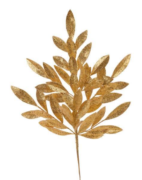 a gold leaf on a white background