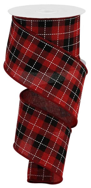 a roll of red and black plaid ribbon