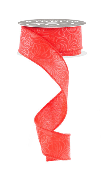 a roll of red ribbon on a white background