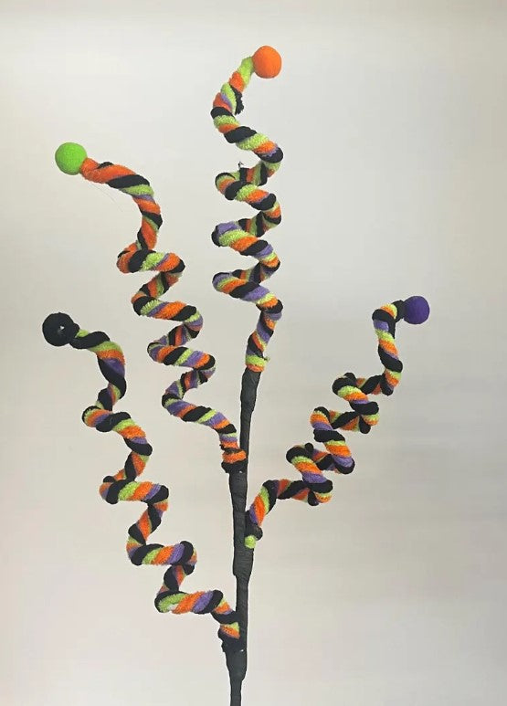 a sculpture of a plant with balls on it