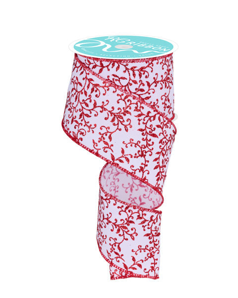 a red and white vase with a red ribbon around it