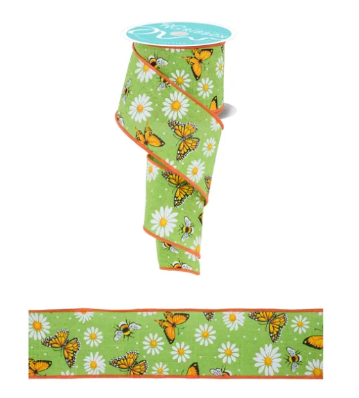 a green ribbon with a repeating pattern of orange butterflies and white daisies.