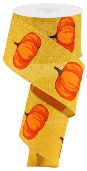 a roll of yellow ribbon with orange peppers on it