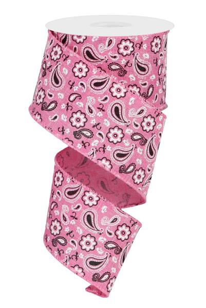 a roll of pink and black paisley ribbon