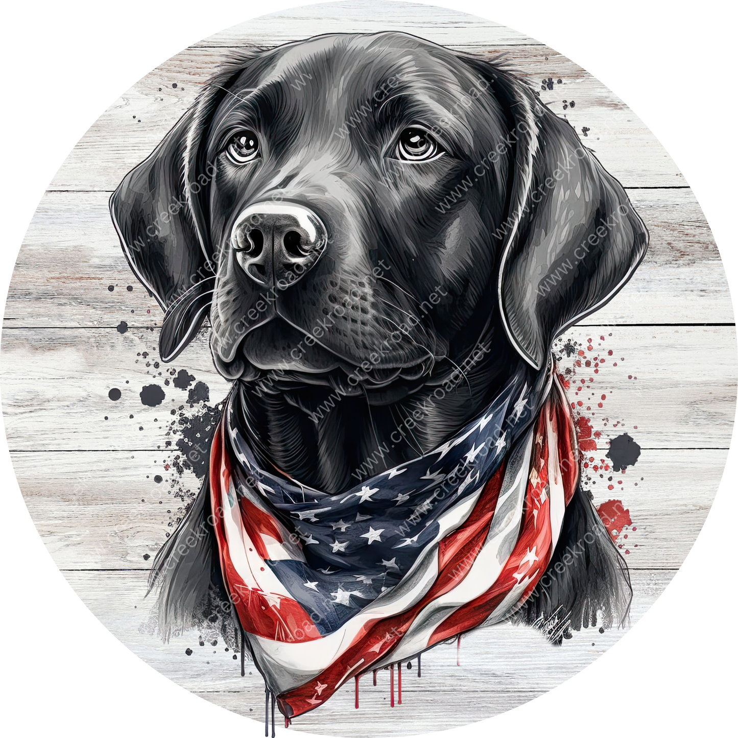 A black dog wearing a red, white, and blue American flag bandana, with a wooden background and splatters of paint.
