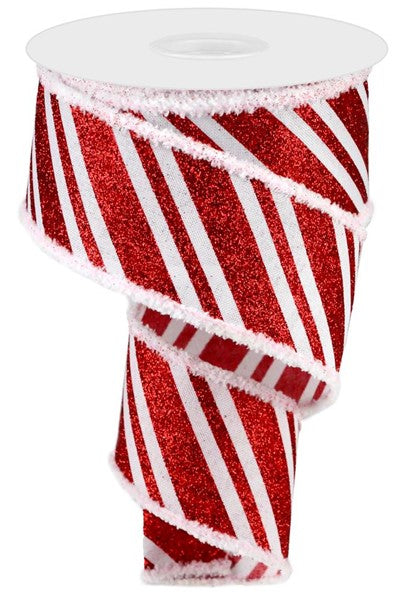 a roll of red and white striped ribbon