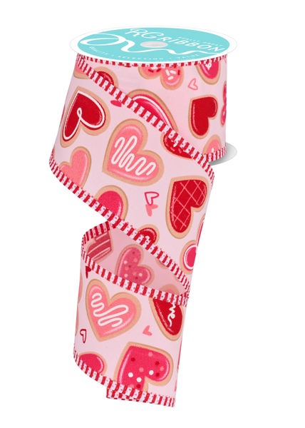 a cup holder with hearts on it