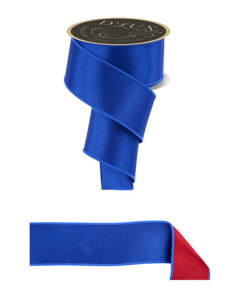 a roll of blue satin ribbon with a red ribbon