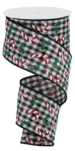 a black and white checkered ribbon with candy canes on it