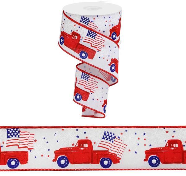 a roll of toilet paper with a red truck on it