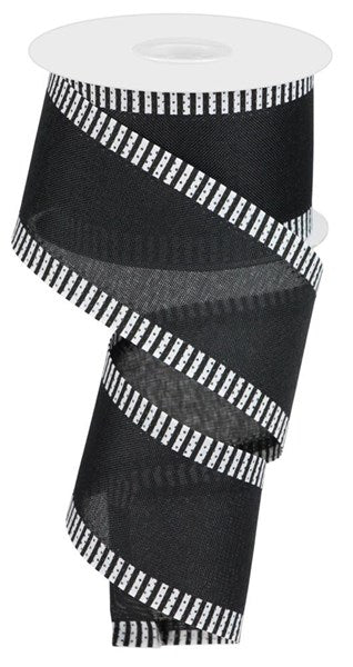 a roll of black and white ribbon on a white background