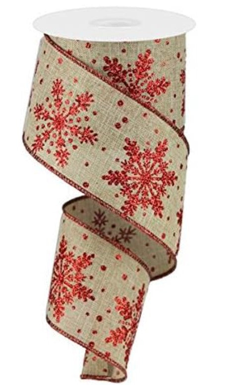 a red and white ribbon with snowflakes on it
