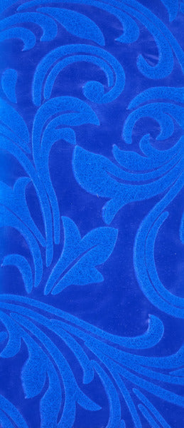 a close up of a blue surface with a design on it