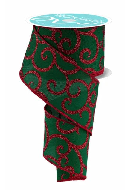 a green and red spiral-patterned ribbon.