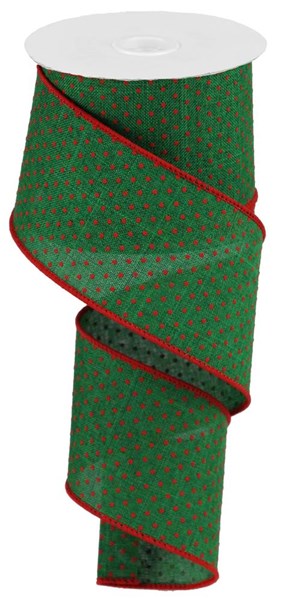 a roll of green and red ribbon on a white background