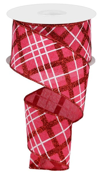 a roll of red and white plaid ribbon