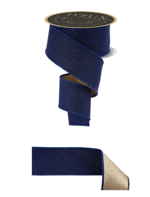 a roll of navy blue ribbon with a gold label, and a smaller piece of the same ribbon.