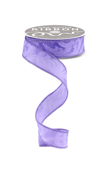 a roll of purple satin ribbon on a white background