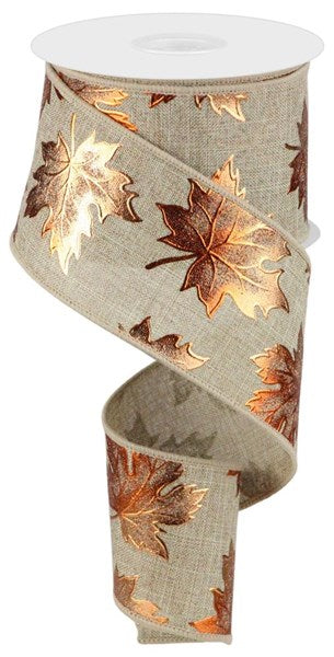a roll of ribbon with leaves on it
