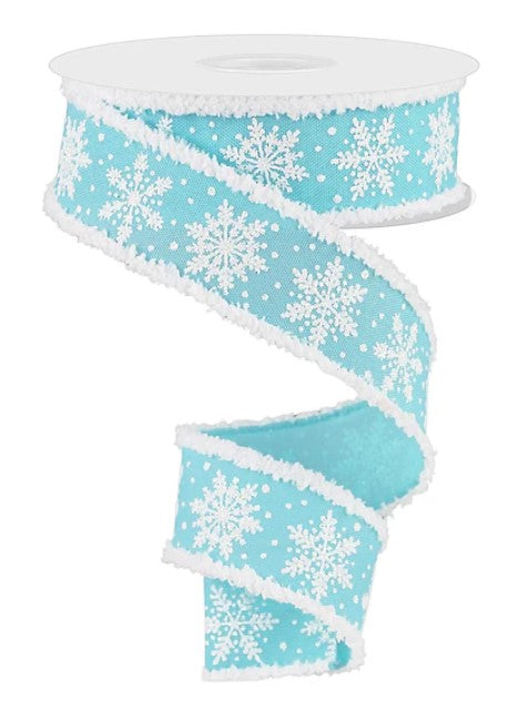 A turquoise and white snowflake-patterned ribbon is shown, with a white top and bottom.