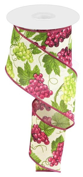 a roll of ribbon with grapes on it