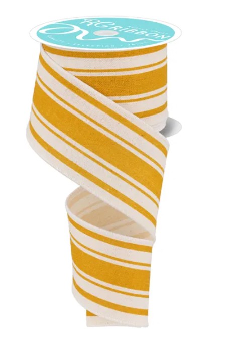 a roll of ribbon with a striped pattern in shades of yellow and white.